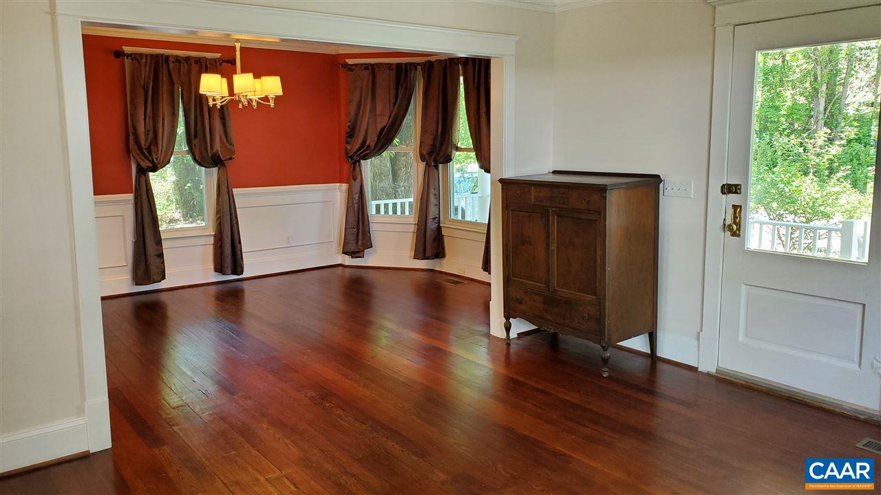 3007 Morgantown Road Charlottesville, VA 22903 - Photo 2 of 30 a view of empty room with wooden floor and fan