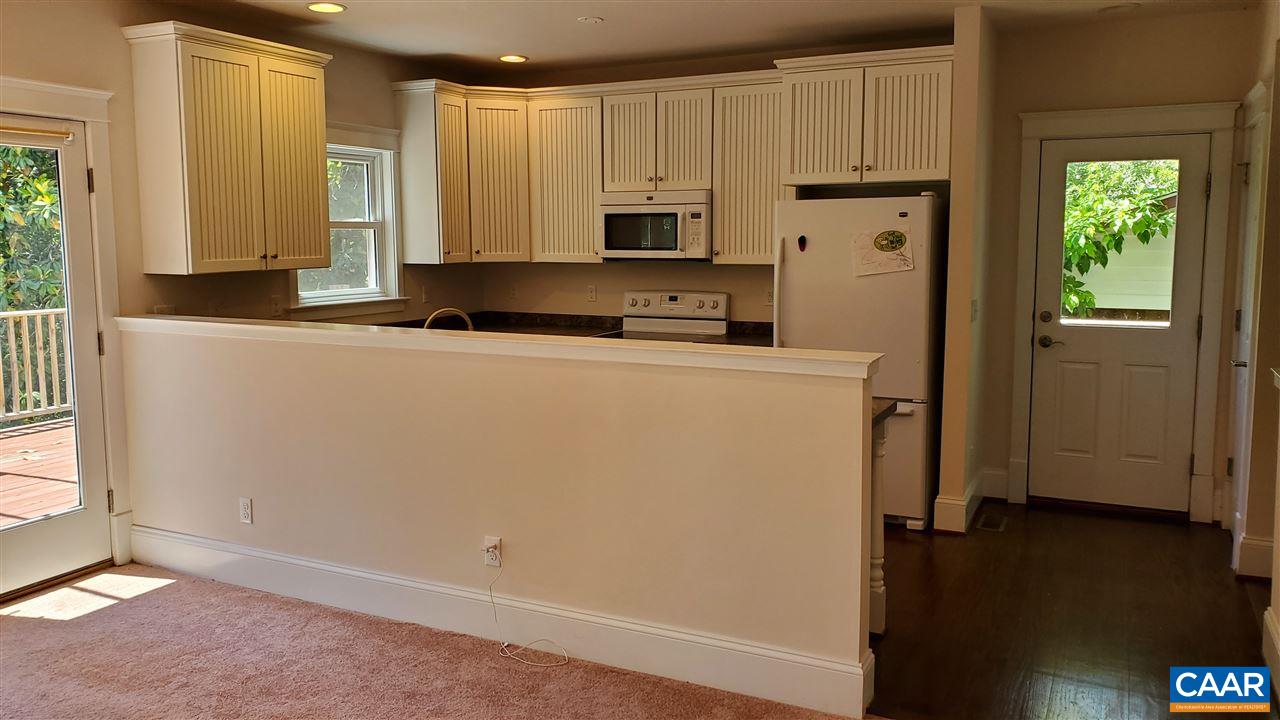 3007 Morgantown Road Charlottesville, VA 22903 - Photo 7 of 30 a view of a kitchen with wooden floor