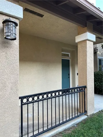 a view of a porch with a door