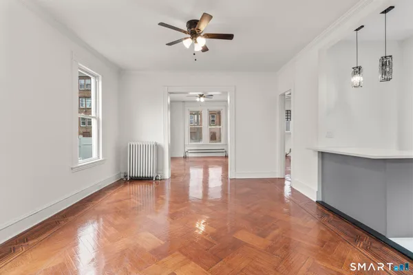 a view of an empty room with a window