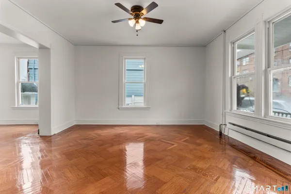 a view of an empty room with a window