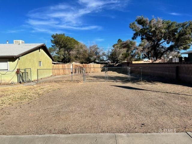 208 South Forest Knoll Street Ridgecrest, CA 93555 - Photo 26 of 26 a view of back yard of the house