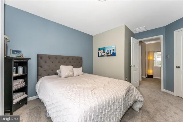 a view of a backyard with table and chairs