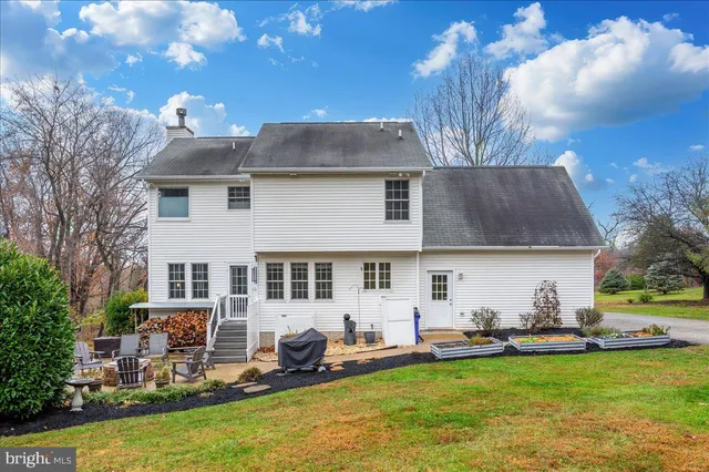 a view of a yard with swimming pool