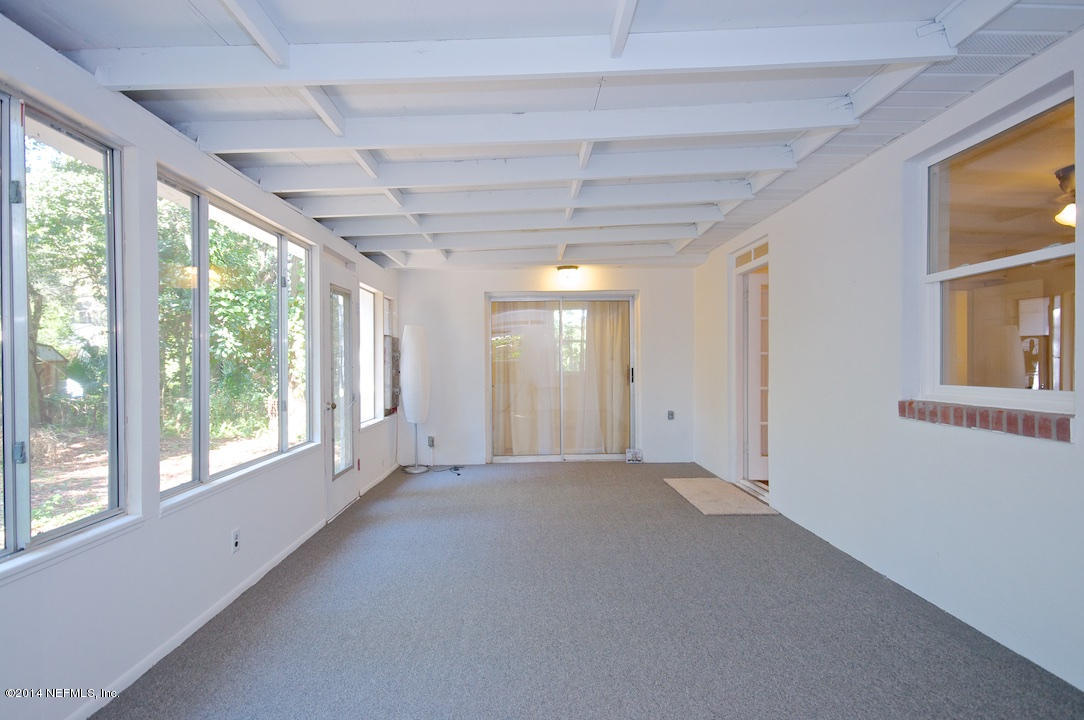 5614 Stetson Road Jacksonville, FL 32207 - Photo 16 of 20 a view of an empty room with a window