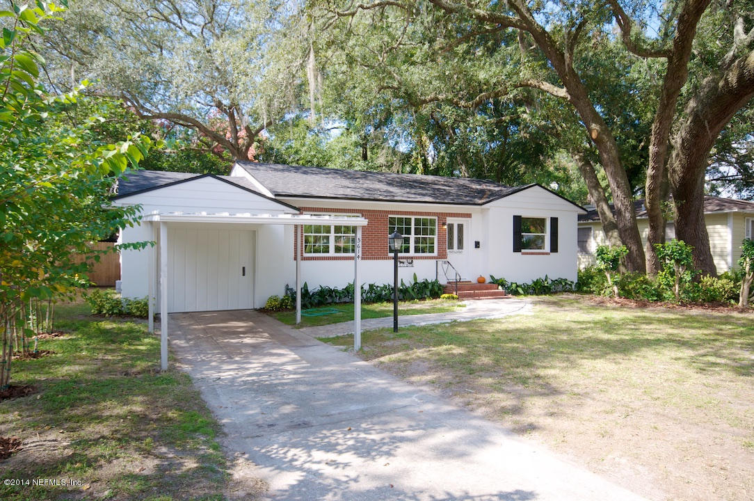 5614 Stetson Road Jacksonville, FL 32207 - Photo 2 of 20 a view of a house with a yard and large tree