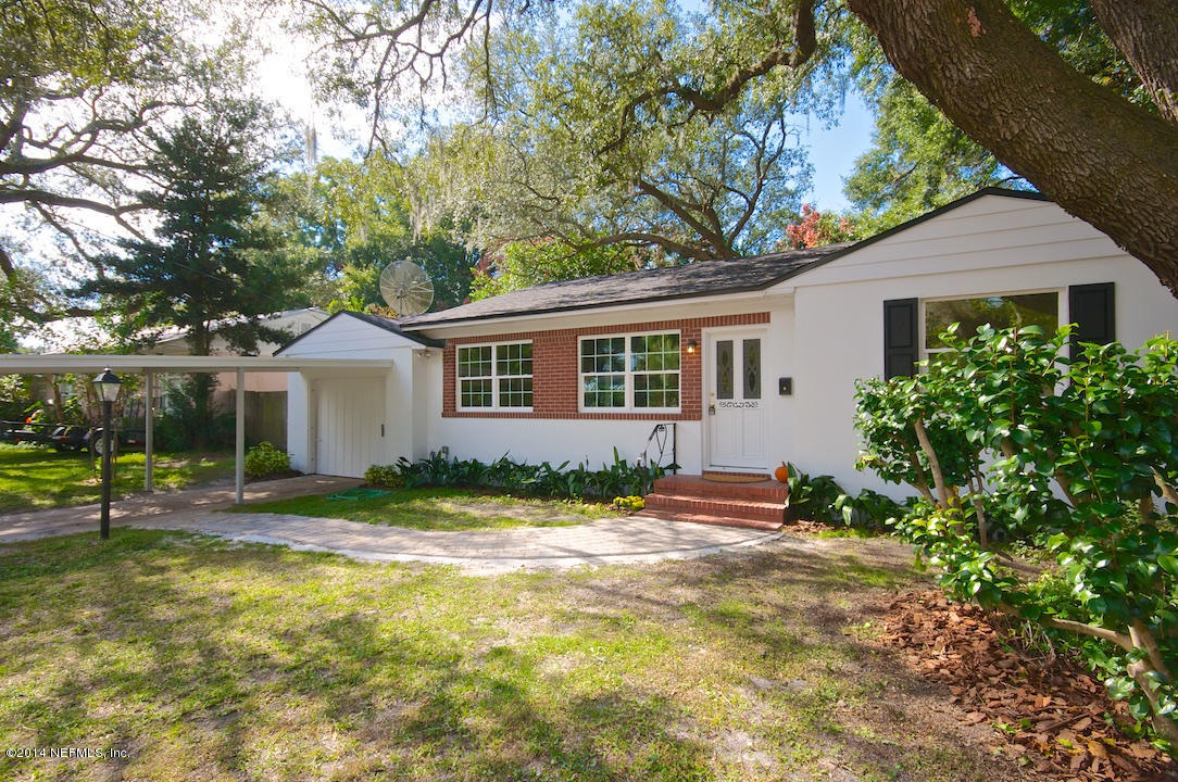 5614 Stetson Road Jacksonville, FL 32207 - Photo 3 of 20 a front view of a house with a yard