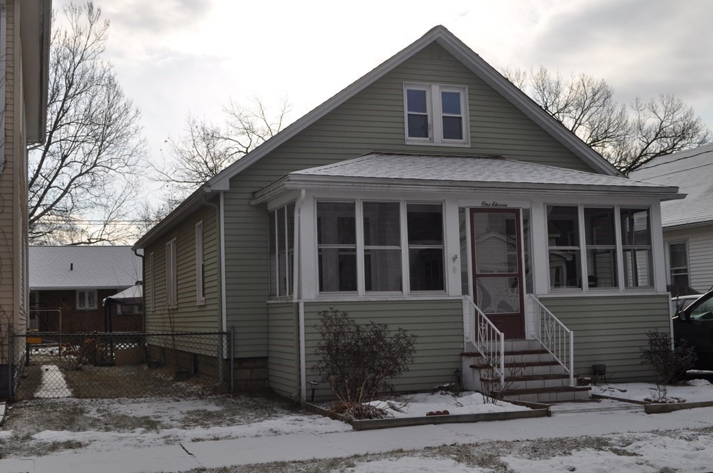 111 Wilber Street Springfield, MA 01104 - Photo 1 of 26 a front view of a house with a yard