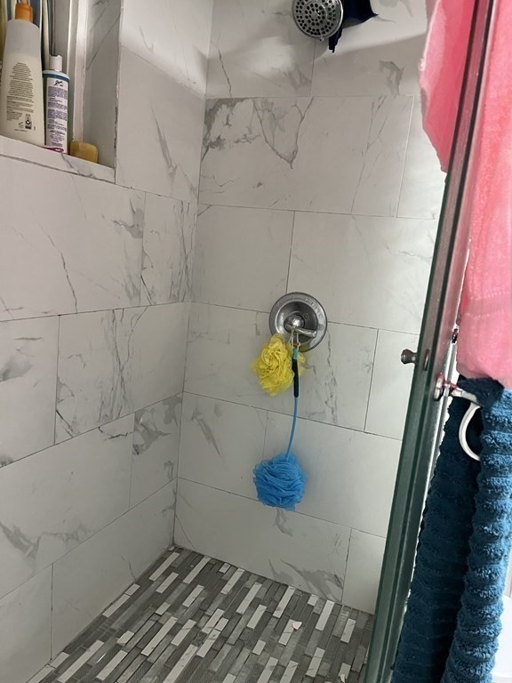 111 Wilber Street Springfield, MA 01104 - Photo 24 of 26 a bathroom with a shower