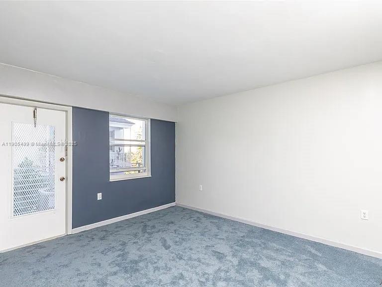 1545 Euclid Avenue, Unit 2D Miami Beach, FL 33139 - Photo 16 of 23 an empty room with windows