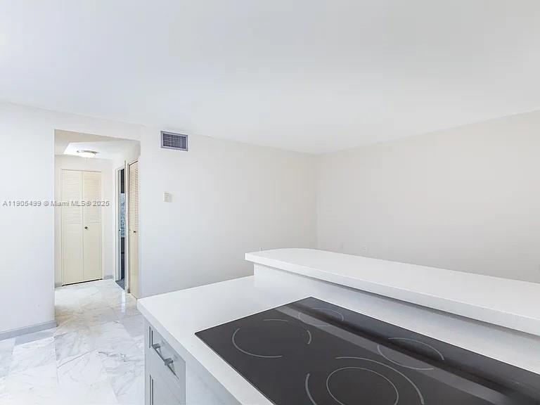1545 Euclid Avenue, Unit 2D Miami Beach, FL 33139 - Photo 19 of 23 a utility room with dryer and washer