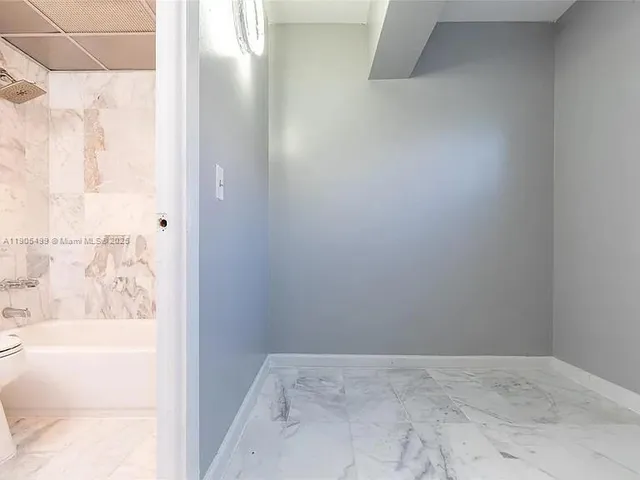 a view of bathroom with bathtub