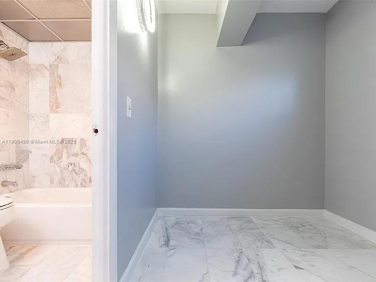 1545 Euclid Avenue, Unit 2D Miami Beach, FL 33139 - Photo 2 of 23 a view of bathroom with bathtub