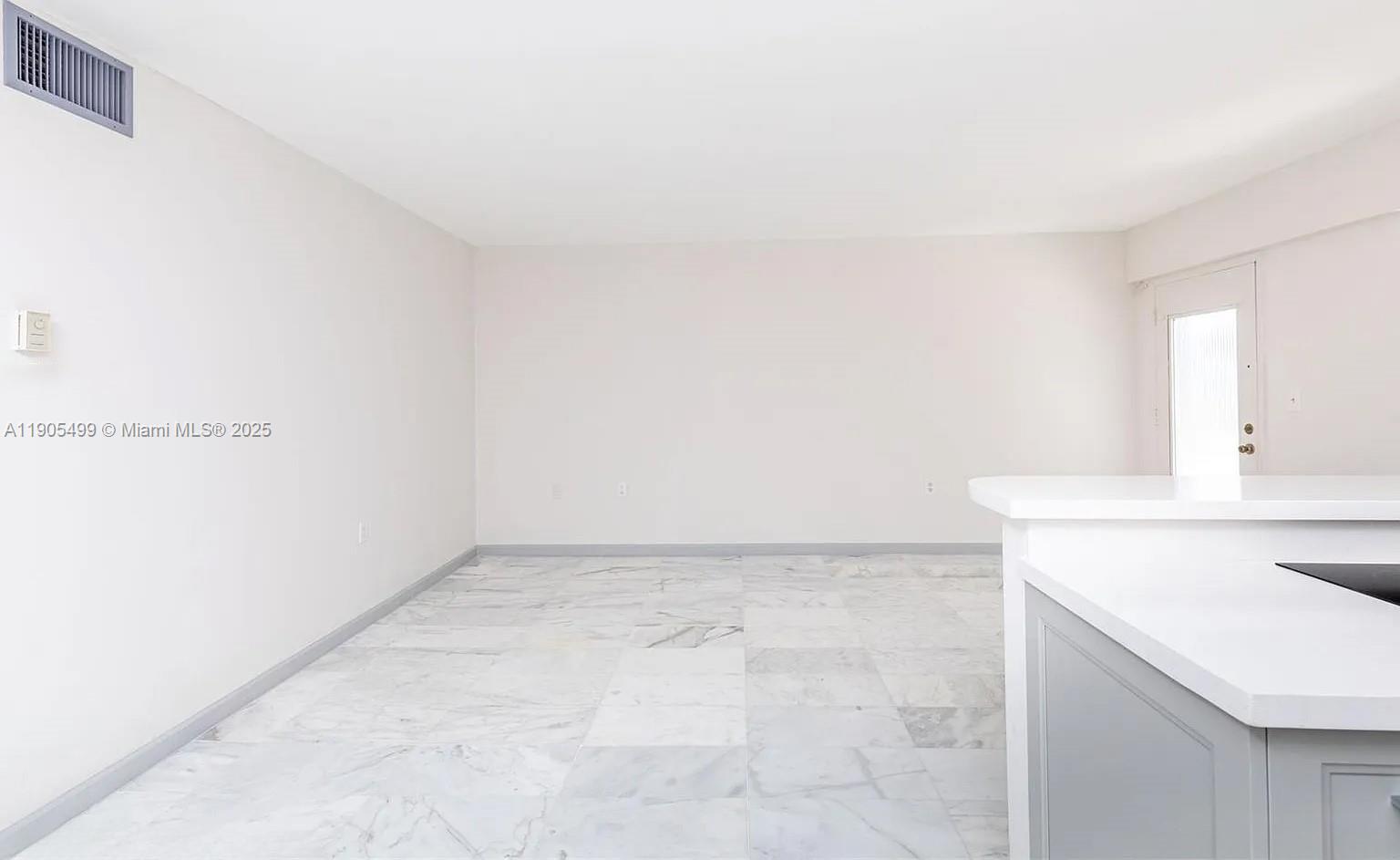 1545 Euclid Avenue, Unit 2D Miami Beach, FL 33139 - Photo 9 of 23 a view of storage and utility room with a sink