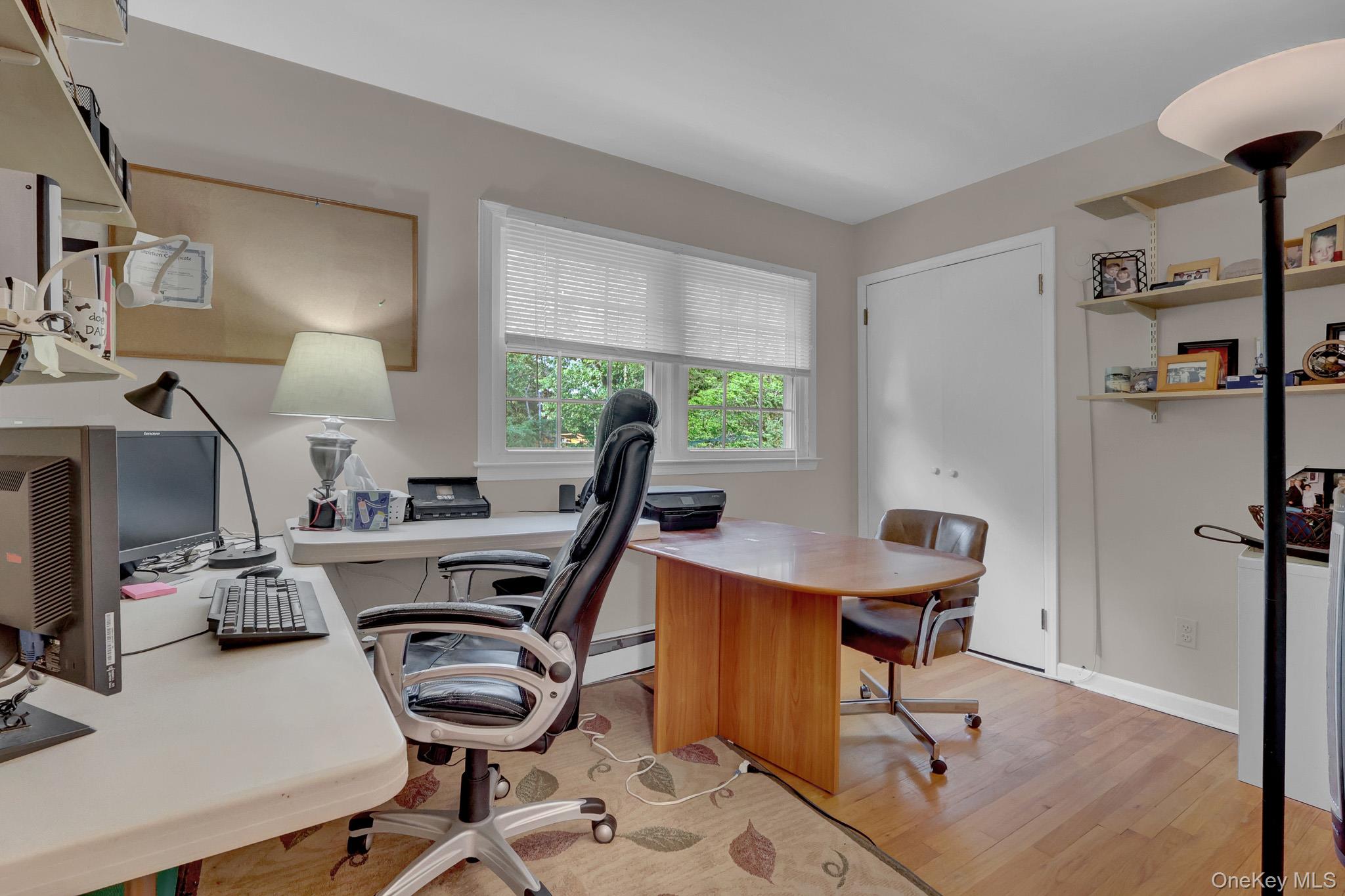 15 Stillwater Road Nissequogue, NY 11780 - Photo 27 of 43 Room featuring hardwood flooring and light neutral wall paint