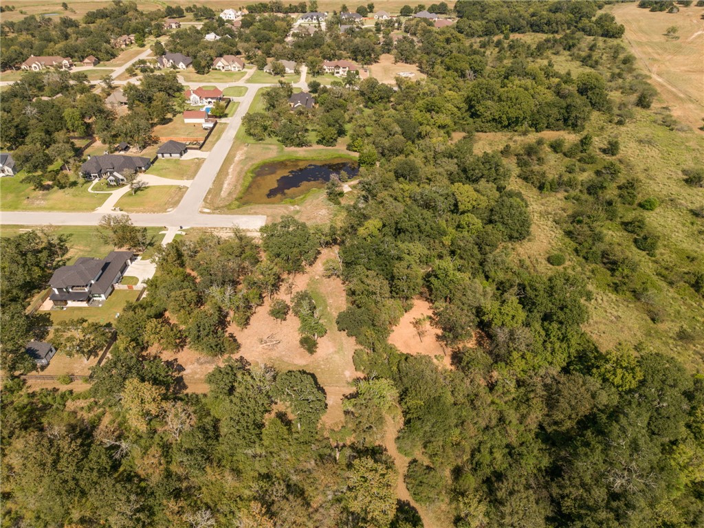 7730 Mary's Way Bryan, TX 77808 - Photo 8 of 10 a view of residential houses with yard