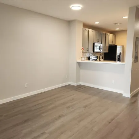 a white toilet sitting in a bathroom