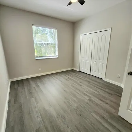 a bathroom with a sink and a mirror with toilet