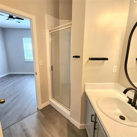 wooden floor and window in an empty room