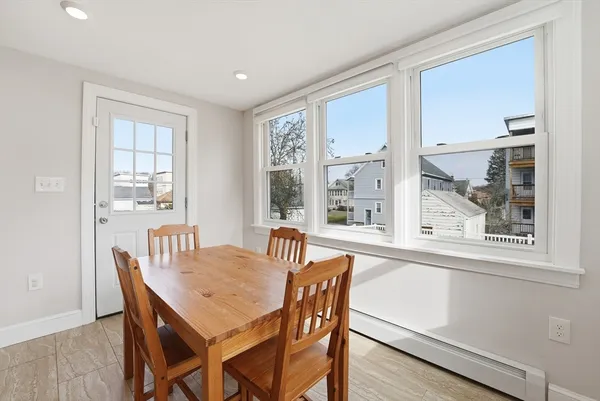 a kitchen with stainless steel appliances granite countertop wooden cabinets granite counter tops and a stove