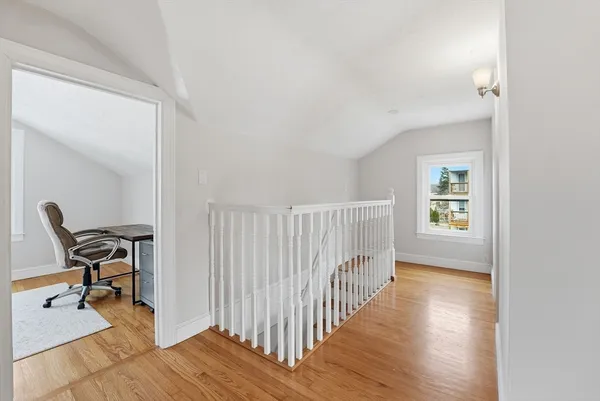 a front view of a house with a yard table and chairs