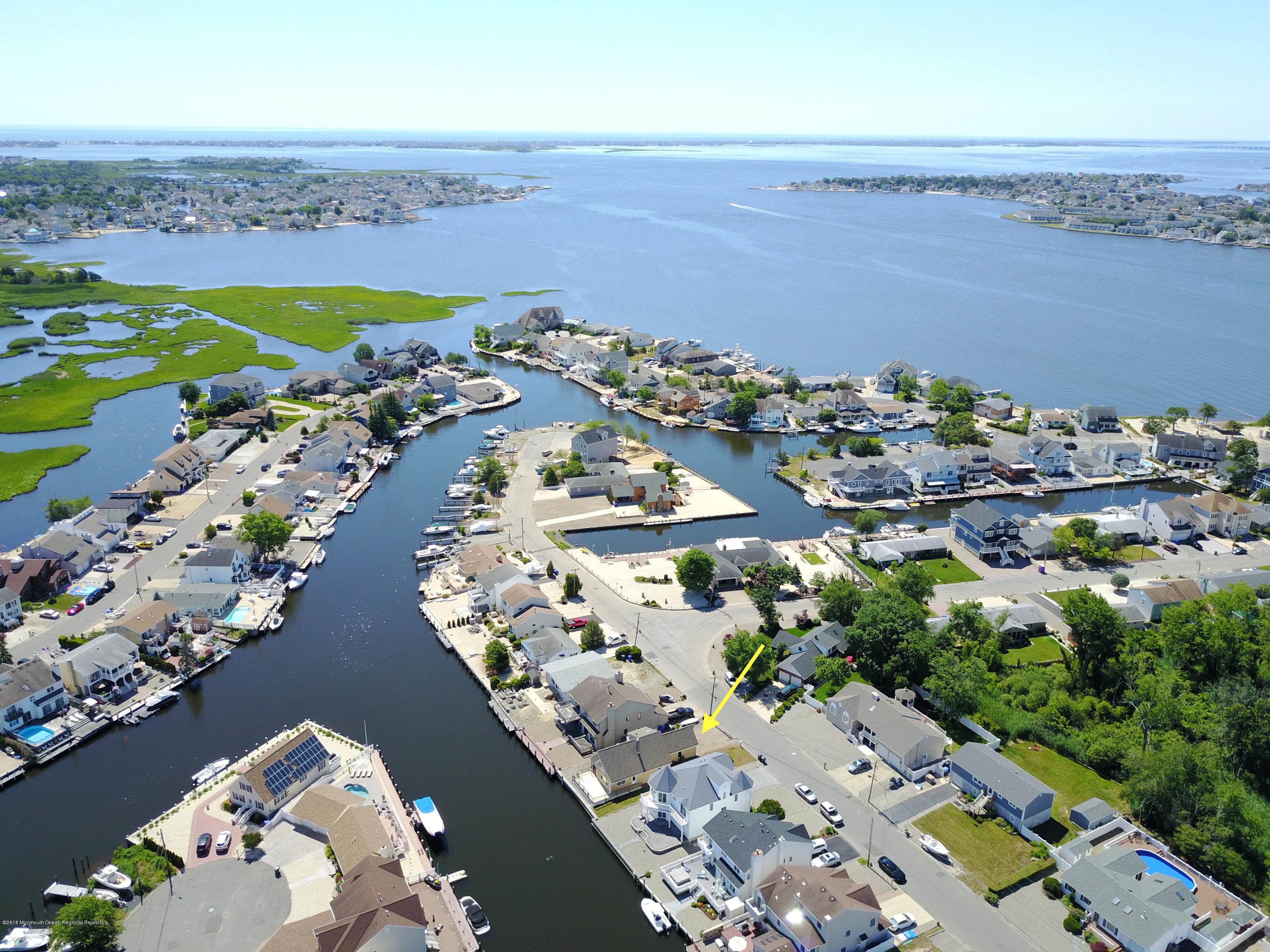 41 Club House Road Brick, NJ 08723 - Photo 1 of 33 an aerial view of a house with a ocean view