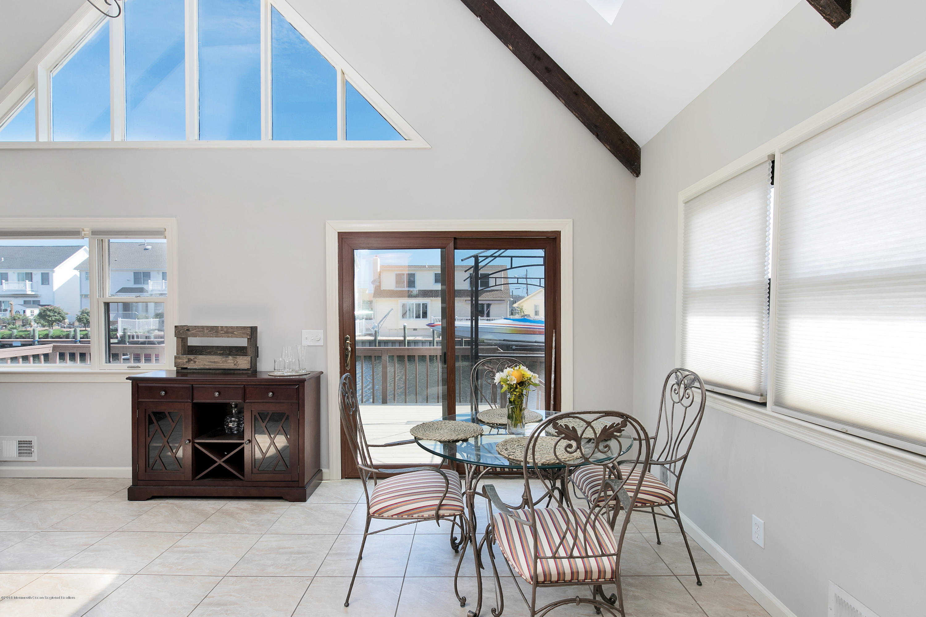 41 Club House Road Brick, NJ 08723 - Photo 14 of 33 a view of a dining room with furniture and a window