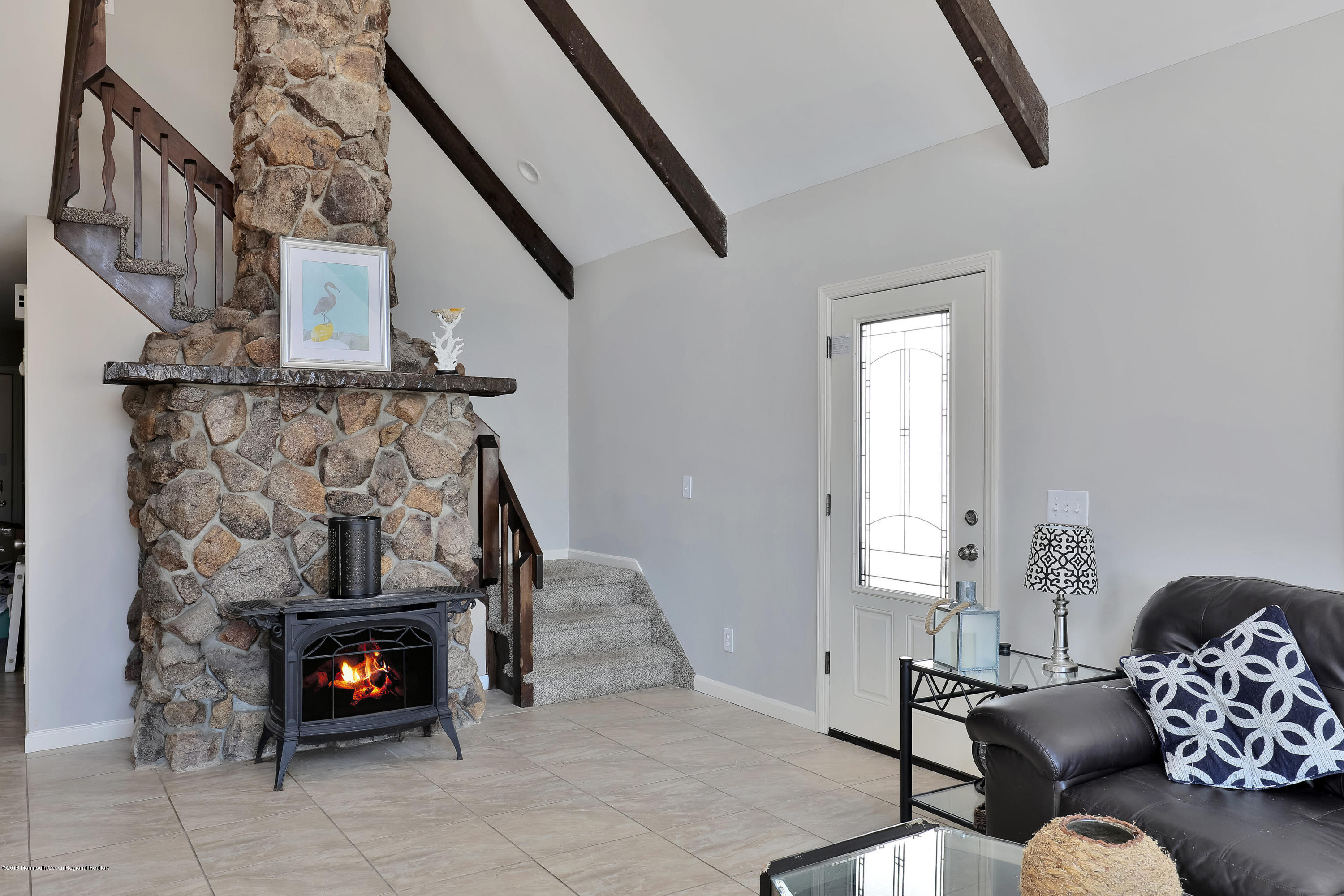 41 Club House Road Brick, NJ 08723 - Photo 16 of 33 a living room with furniture and a fireplace