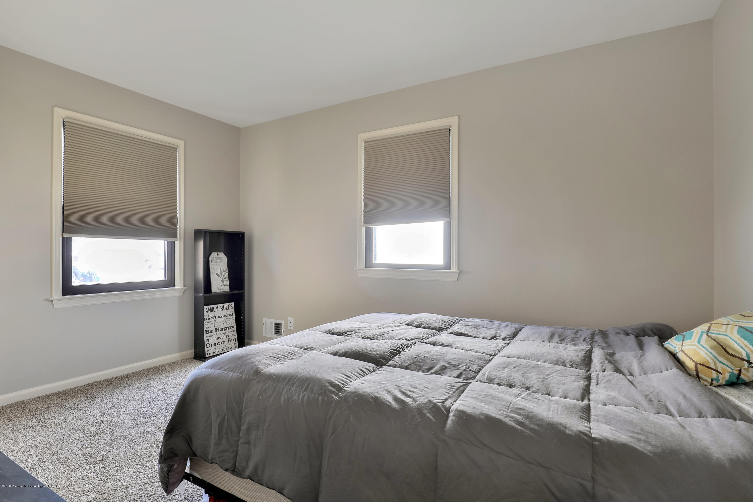 41 Club House Road Brick, NJ 08723 - Photo 18 of 33 a bedroom with a bed and a window