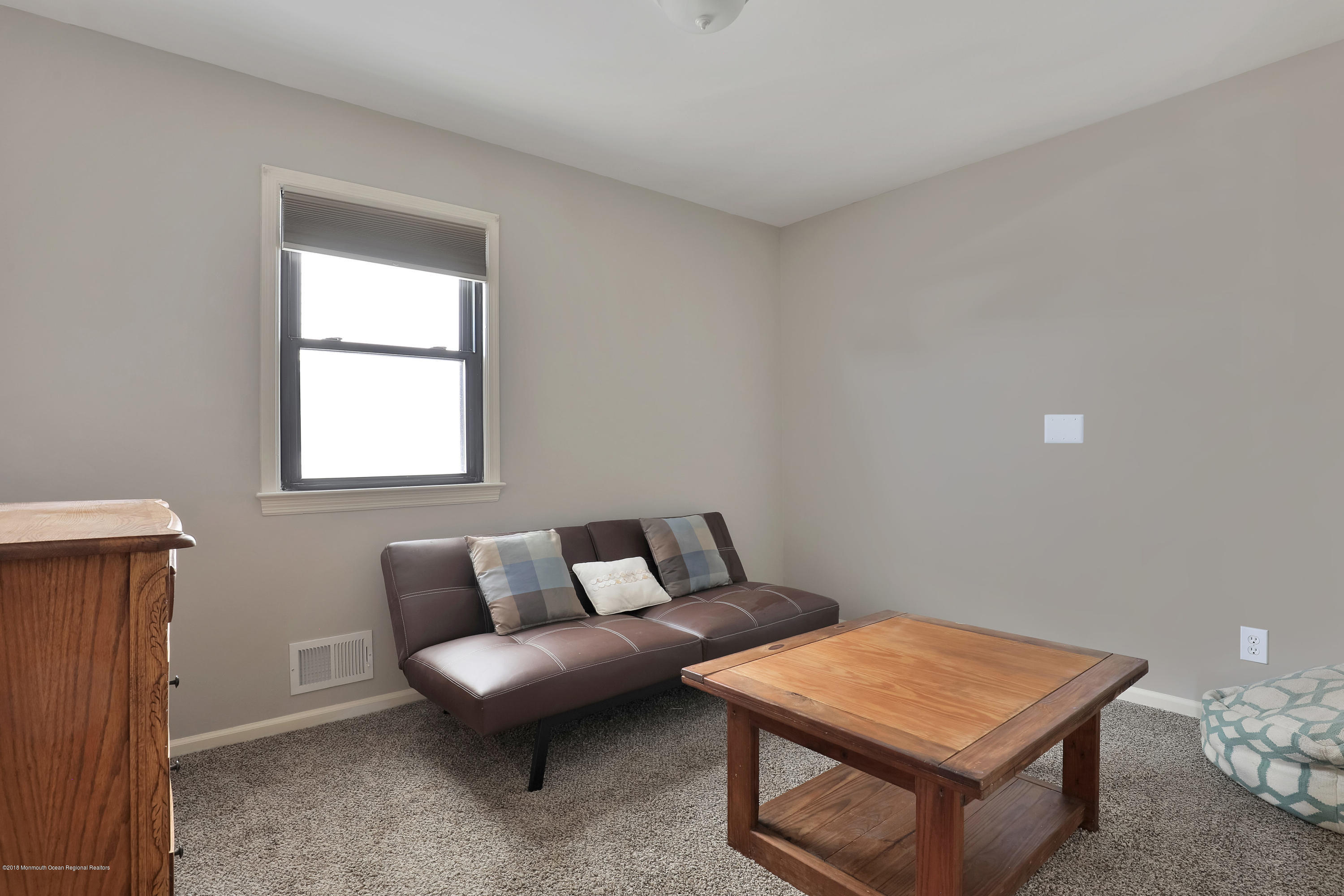 41 Club House Road Brick, NJ 08723 - Photo 19 of 33 a living room with furniture and a window