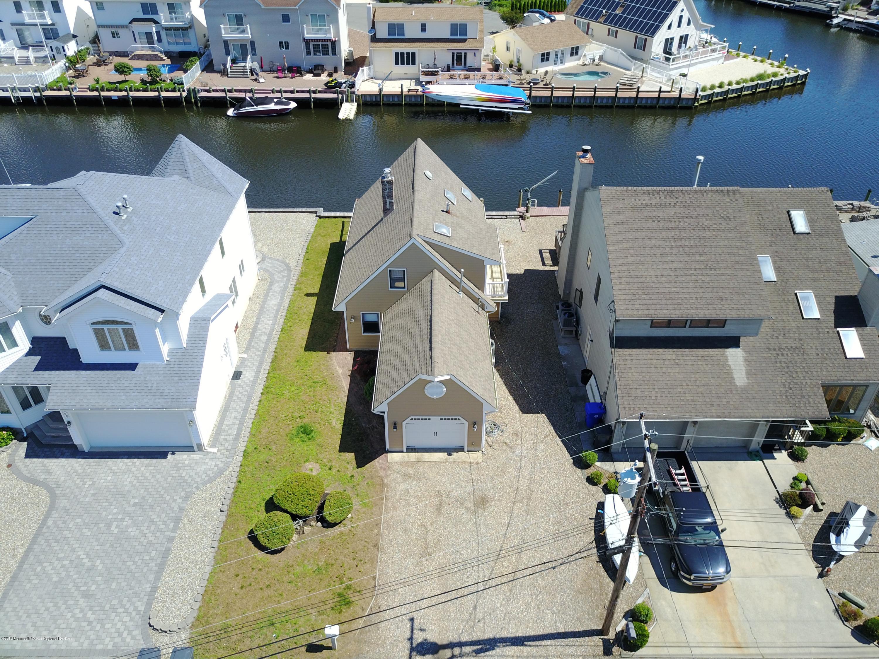 41 Club House Road Brick, NJ 08723 - Photo 28 of 33 an aerial view of a house with outdoor space