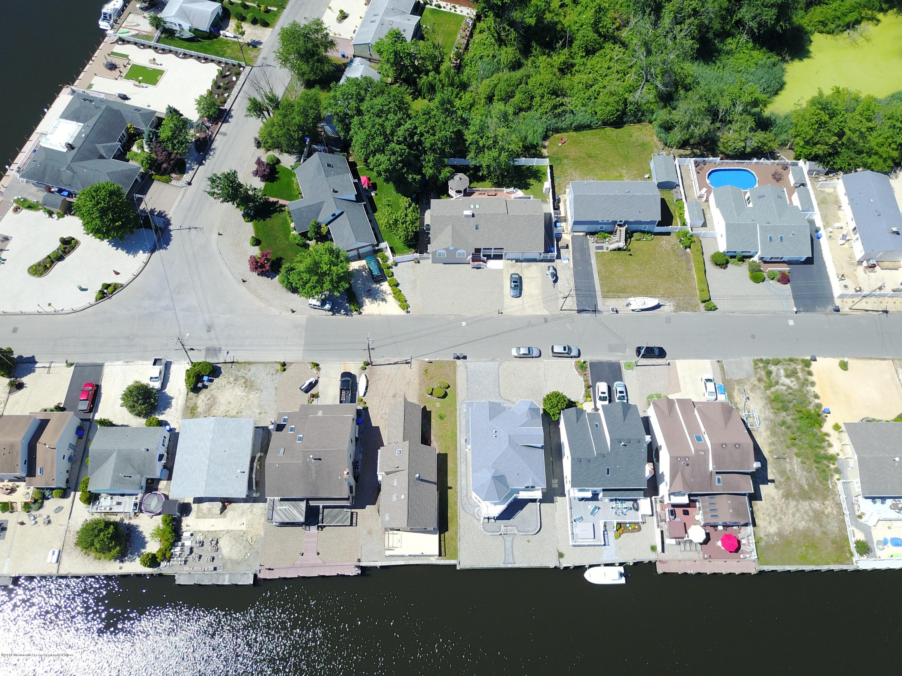 41 Club House Road Brick, NJ 08723 - Photo 29 of 33 an aerial view of residential houses with outdoor space