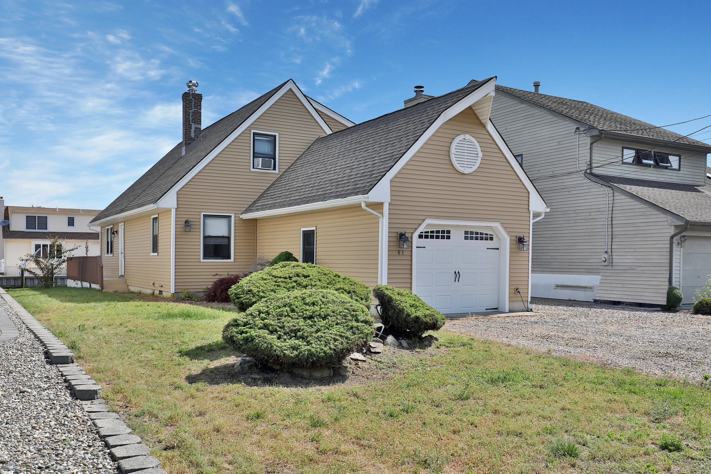 41 Club House Road Brick, NJ 08723 - Photo 4 of 33 a front view of a house with a yard