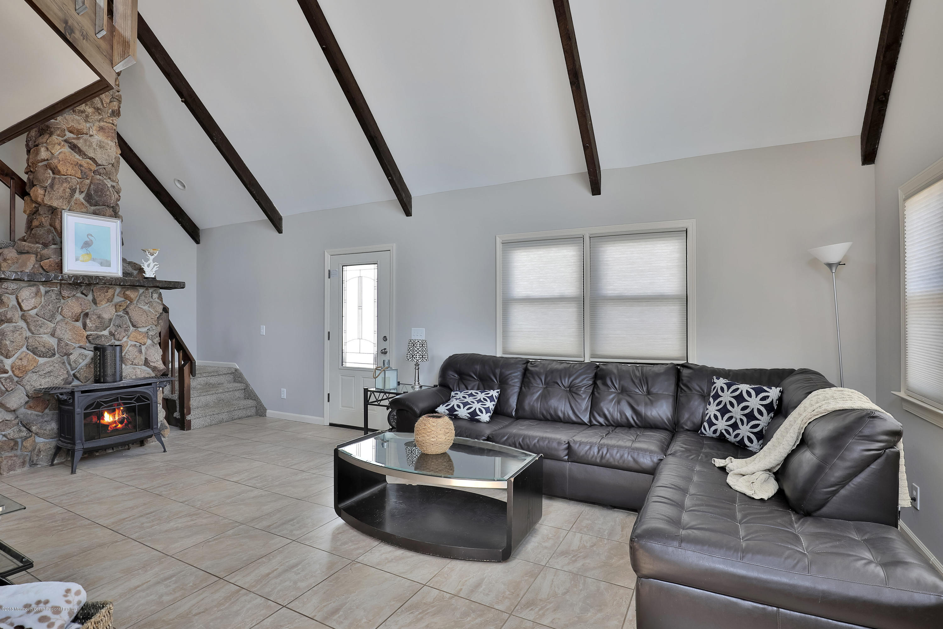 41 Club House Road Brick, NJ 08723 - Photo 7 of 33 a living room with furniture and a fireplace