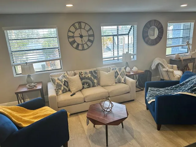 a bedroom with bed and a window