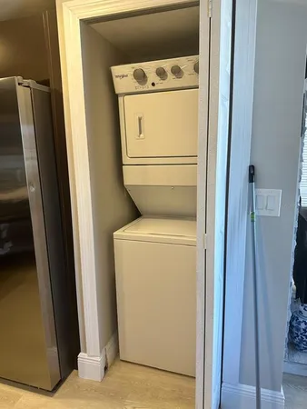 a view of a swimming pool with a lounge chair