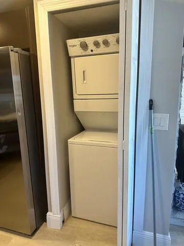 a view of a swimming pool with a lounge chair