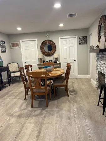a view of a dining room with furniture
