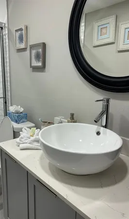 a bedroom with bed and window