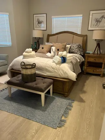a view of a balcony with wooden floor and outdoor space