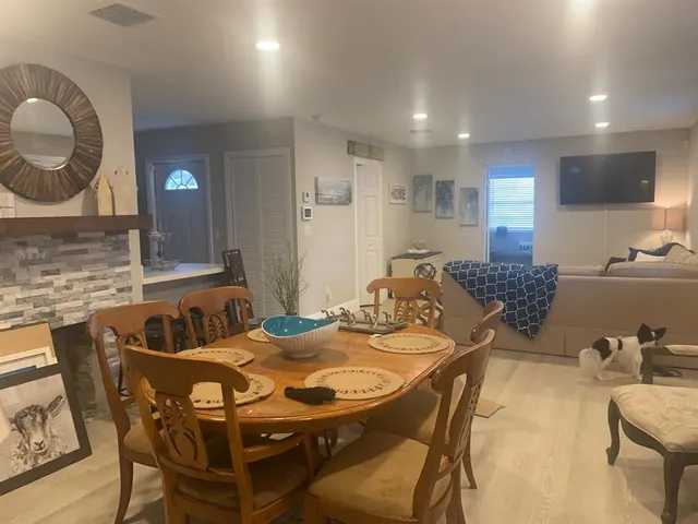 a bedroom with bed and a night stand