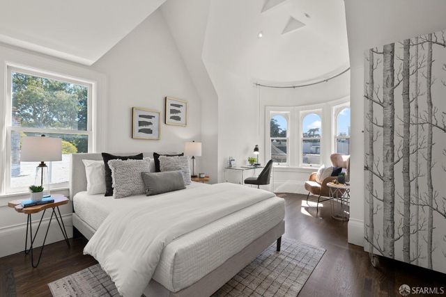 a work room with furniture and a window