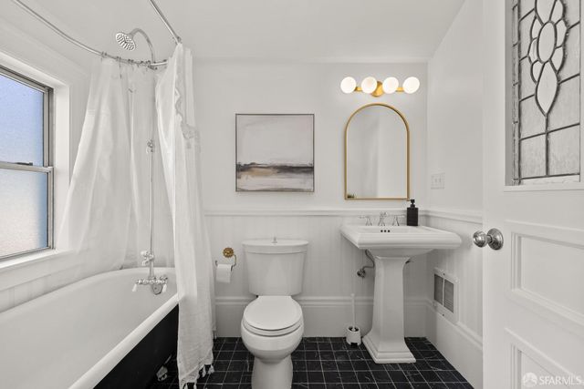 a bathroom with a bathtub