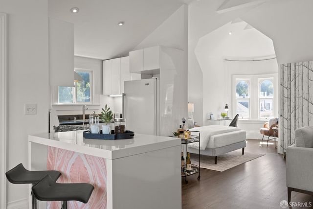 a living room with furniture and a table