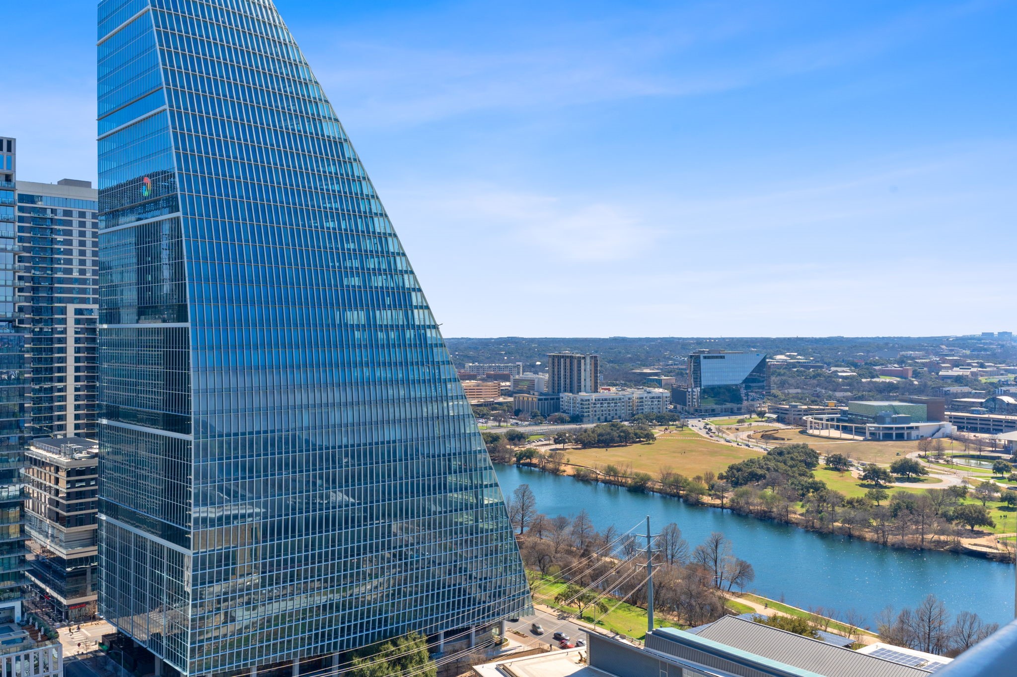 222 West Avenue, Unit 2403 Austin, TX 78701 - Photo 14 of 38 a view of a lake with tall buildings