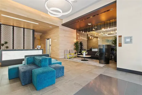 a bathroom with a tub and sink