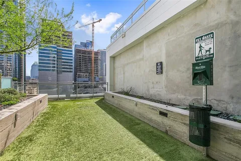 a view of swimming pool with outdoor seating