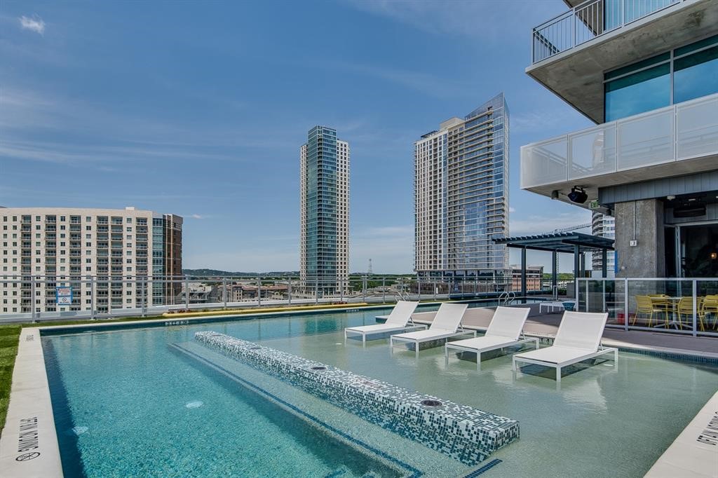222 West Avenue, Unit 2403 Austin, TX 78701 - Photo 27 of 38 a view of swimming pool with outdoor seating