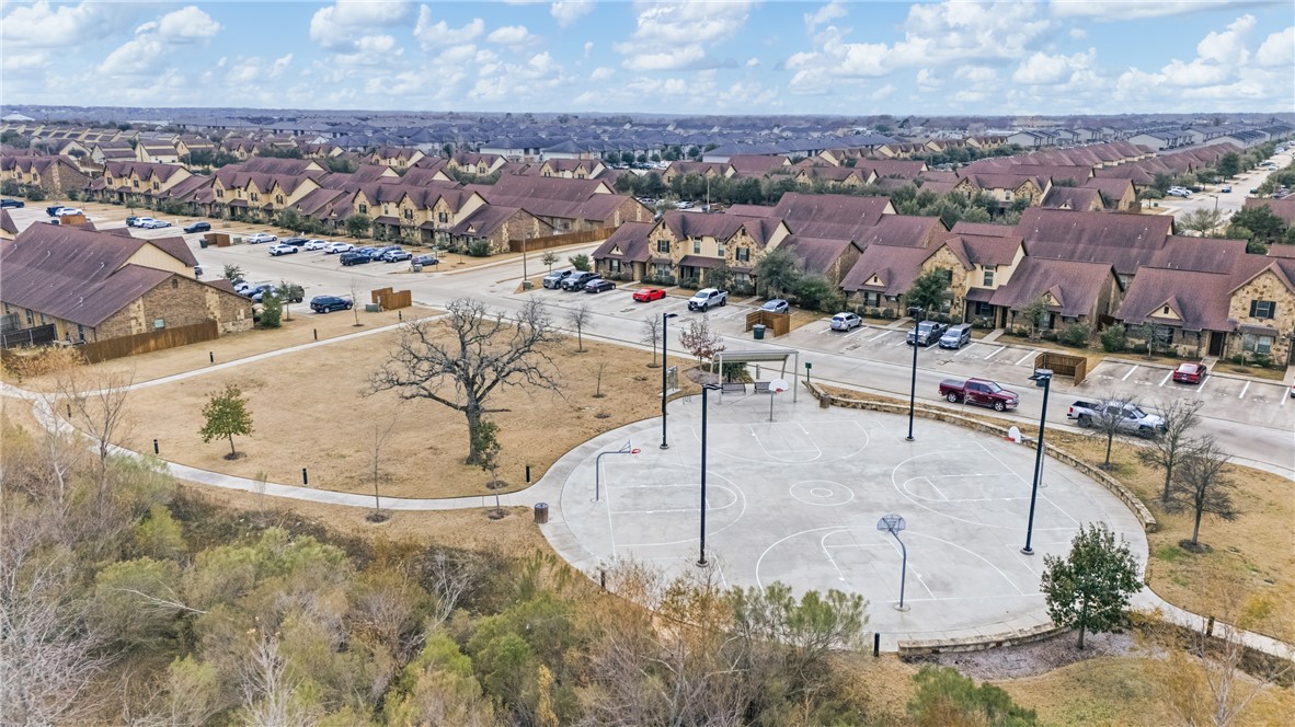 3205 Corporal Road College Station, TX 77845 - Photo 25 of 29 an aerial view of a swimming pool with lawn chairs