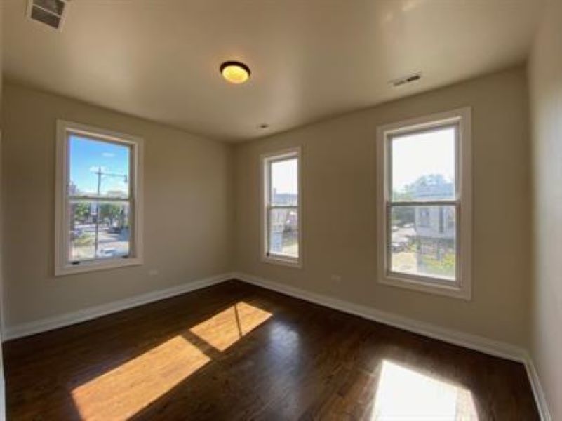 1734 West 35th Street, Unit 2F Chicago, IL 60609 - Photo 2 of 7 a view of an empty room and window